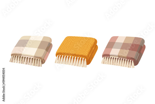 Three folded blankets with tassels, featuring plaid and herringbone patterns