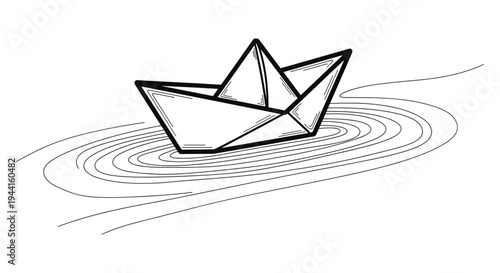 Paper Boat Floating on Water