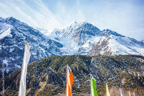 Photos Stunning view of snow-covered Himalayan peaks rising above a rugged alpine landscape in Nepal