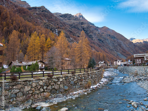 Autumn walk along the Lys River. Gressoney-La-Trinité, Aosta Valley, Italy.