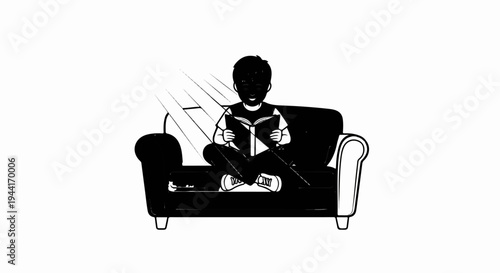 Person reading a book while sitting on a sofa under light rays