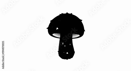 Black silhouette of a mushroom with gills on a white background