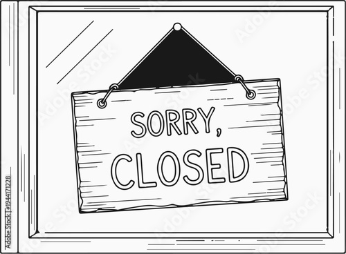 Hanging wooden sign with "SORRY, CLOSED" text in a window frame