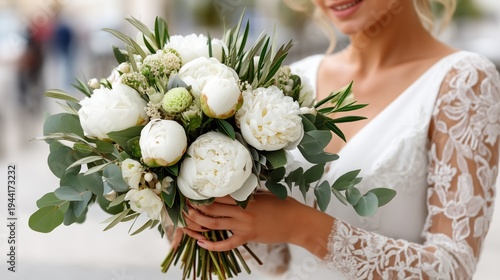 Bride Holding Elegant White Peony Wedding Bouquet