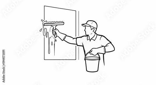 A person in a cap and gloves cleans a window with a squeegee and bucket