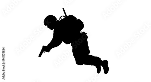 Silhouette of a Soldier in Action, Aiming a Pistol While Falling