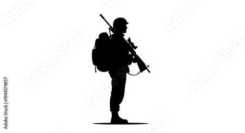 Silhouette of a Soldier with Rifle and Backpack Standing Ready