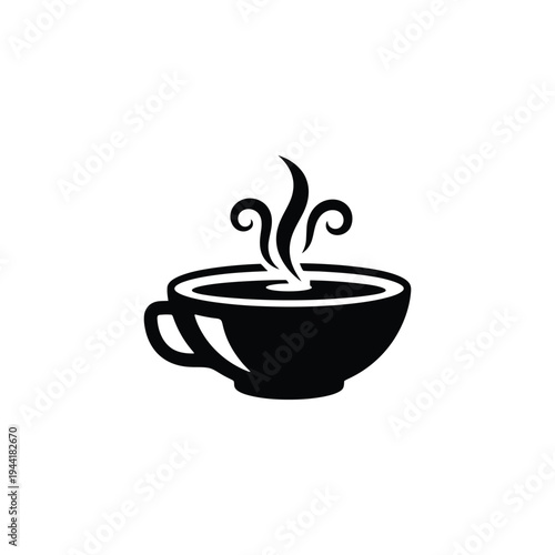 A steaming hot cup of coffee is sitting on a table indoors.