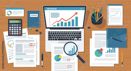 Business office workspace with laptop papers.