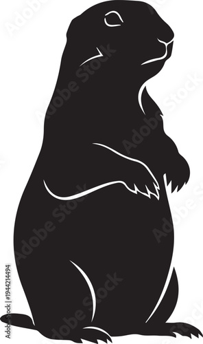 Black silhouette of a groundhog standing on its hind legs