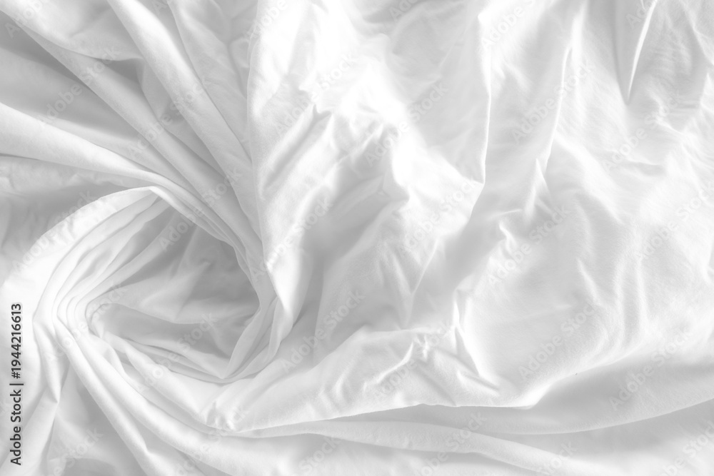 Obraz premium Close-up of white fabric texture with soft natural wrinkles and subtle woven textile pattern. Minimal neutral cloth background suitable for design, fashion, and abstract texture concepts.