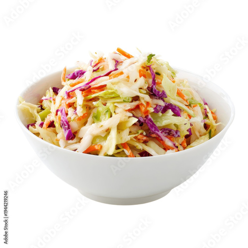 Fresh coleslaw prepared in a white bowl with cabbage, carrots, and seasoning at a kitchen counter during meal preparation on transparent background