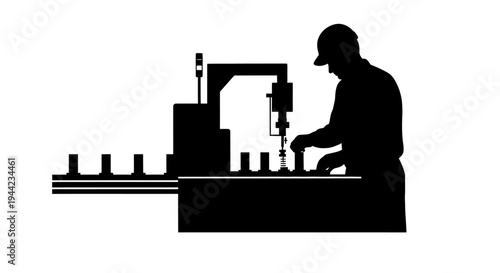 Silhouette of a factory technician working on automated machinery on an assembly line