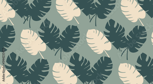 Monstera leaves pattern with green and white.