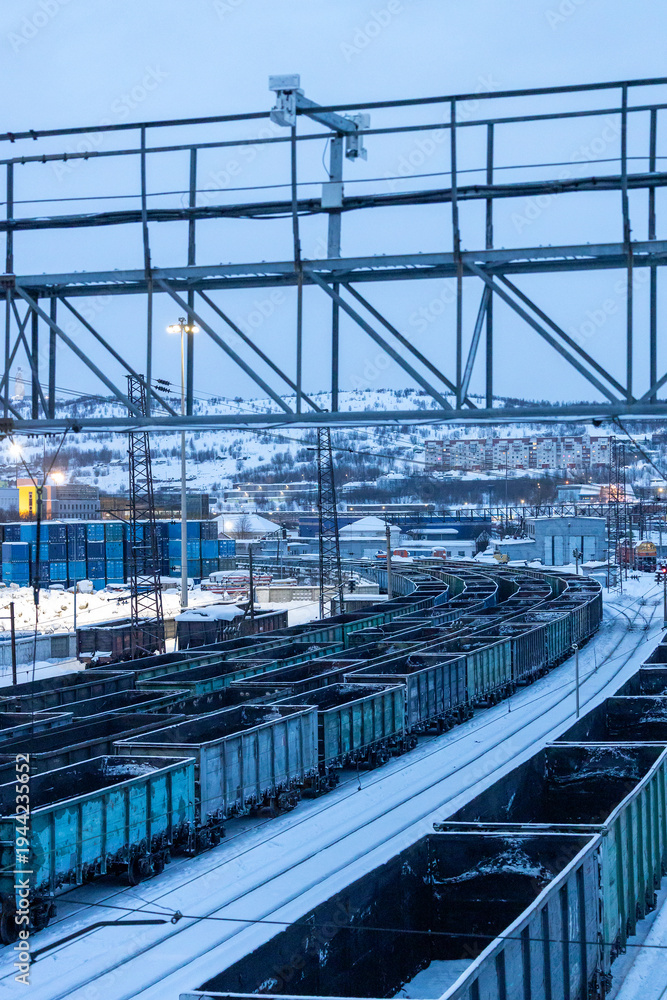 Naklejka premium railroad in blue winter dusk , Murmansk