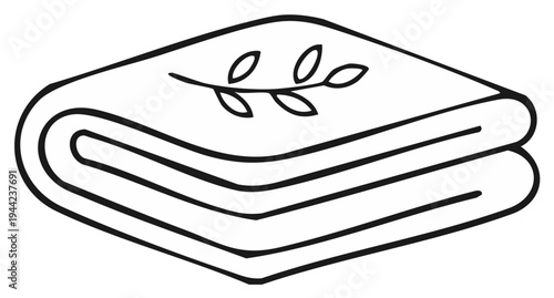 Neatly folded stack of towels or linen with a decorative leafy branch illustration