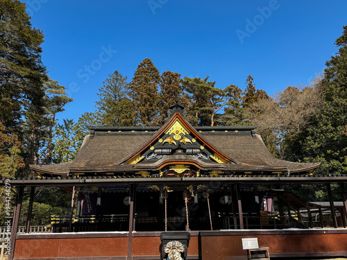 Osaki Hachimangu Shrine historic Shinto shrine in Sendai Japan with traditional architecture under clear blue sky