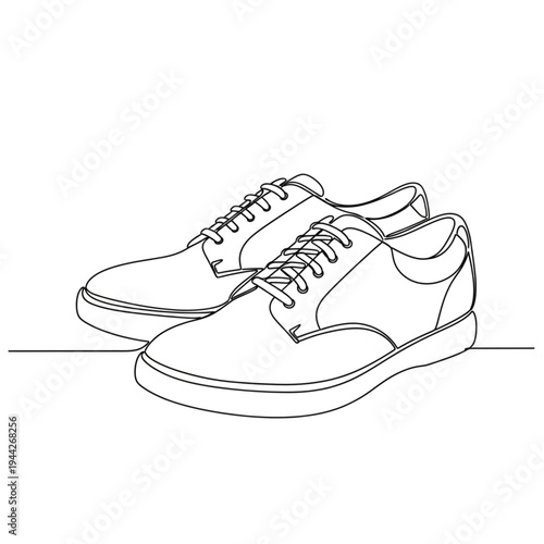 Pair of Sneakers with Laces and Soles.