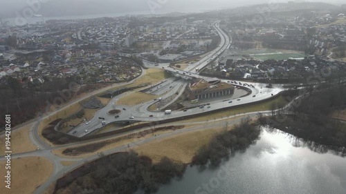 Wallpaper Mural Aerial drone footage showing a suburban area during gloomy midday conditions. The scene features residential houses, streets, and surrounding infrastructure under overcast skies and diffused daylight, Torontodigital.ca