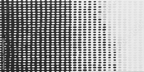A seamless dark metallic mesh texture featuring a black and white polka dot pattern on an industrial grey steel surface for modern technology wallpaper and carbon fiber vector design illustration