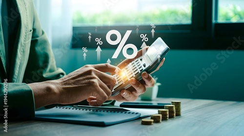 Business professional analyzing financial growth with rising interest rates and calculator on desk
