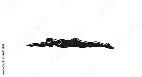 Silhouette of a swimmer performing the butterfly stroke in a pool