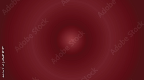 Red background with a slightly bright light in the middle. Abstract red background. Red background with soft light in the center.