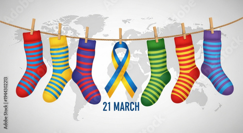 Colorful socks hanging on a line with down syndrome awareness ribbon for world down syndrome day on march 21