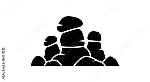 Black silhouette of stacked stones.