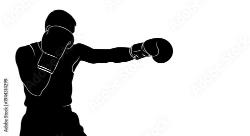 Boxer in fighting stance throwing punch.