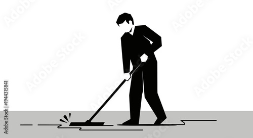 Man in suit sweeping the floor.