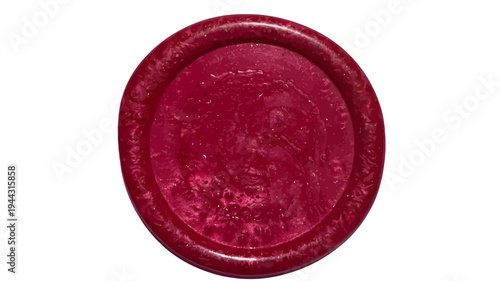 A red oval wax seal with an embossed design