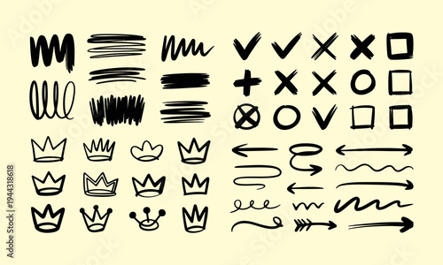 A collection of hand drawn brushstroke shapes crowns arrows and various decorative elements in black on a pale yellow background