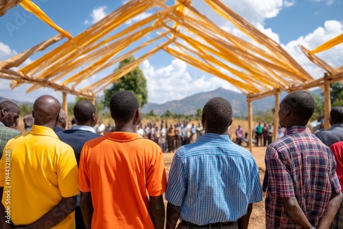 Gathering of People Under Temporary Canopy Structure in Rural Missionary Setting
