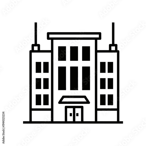 Modern industrial building with sleek design and multiple windows