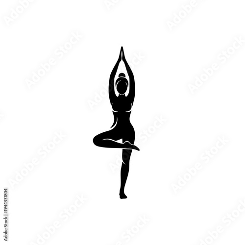 Woman in yoga tree pose silhouette.