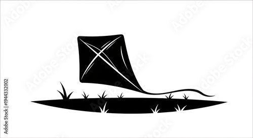 Minimalist Black Kite Resting on Green Grassy Hill