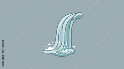 Water cascading down from a high point, creating a beautiful waterfall.