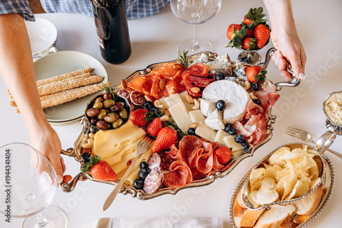 Elegant Charcuterie Board With Cheese, Cured Meats and Fruit for Casual Wine Gathering