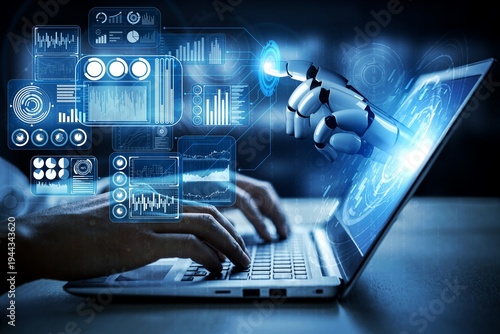 Futuristic robot hand interacting with glowing digital interface on laptop screen displaying charts and graphs