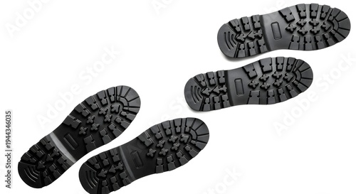 Five black shoe soles arranged in a diagonal line on a white background