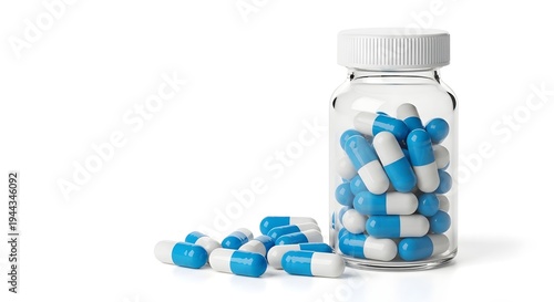 A clear bottle of blue and white capsules on a white background for healthcare