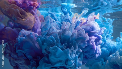 Colorful ink clouds in water closeup.