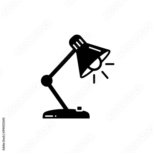 Black desk lamp with light rays.