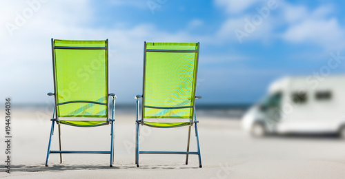 Camper on a sandy beach with blurred background