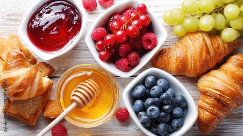 continental. A continental breakfast arrangement with croissants and fruits from above. menu design, packaging mockups, designed for food delivery and cloud-kitchen brand materials.