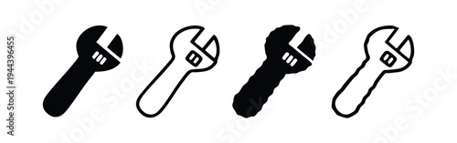 Adjustable wrench or spanner icon set in filled and outline styles