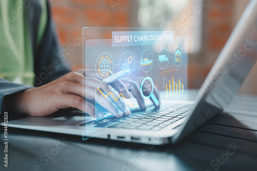 Photography Logistics manager using stylus on tablet with virtual broken supply chain and ca