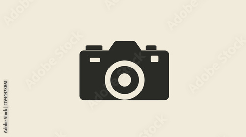 A flat illustration of a black camera icon centered on a light beige background