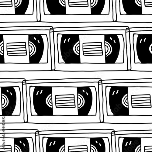 Seamless pattern with retro VHS cassette tapes in hand drawn black line style. Minimal vector background inspired by vintage video technology and nostalgic media.